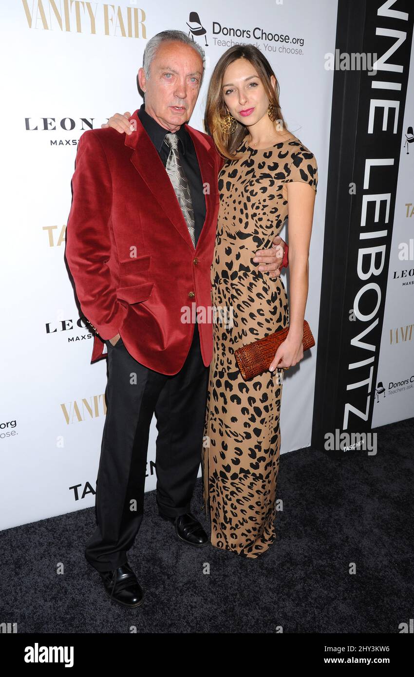 Udo Kier and Charlotte Taschen arrives at Annie Leibovitz's book launch  party hosted by Vanity Fair, Leon Max, and Benedikt Taschen at the Chateau  Marmont, in West Hollywood, Calif Stock Photo -