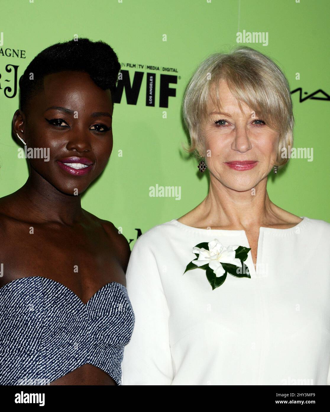 Lupita Nyong'o and Helen Mirren Women In Film Pre-Oscar Cocktail Party held at Fig & Olive, Los Angeles Stock Photo