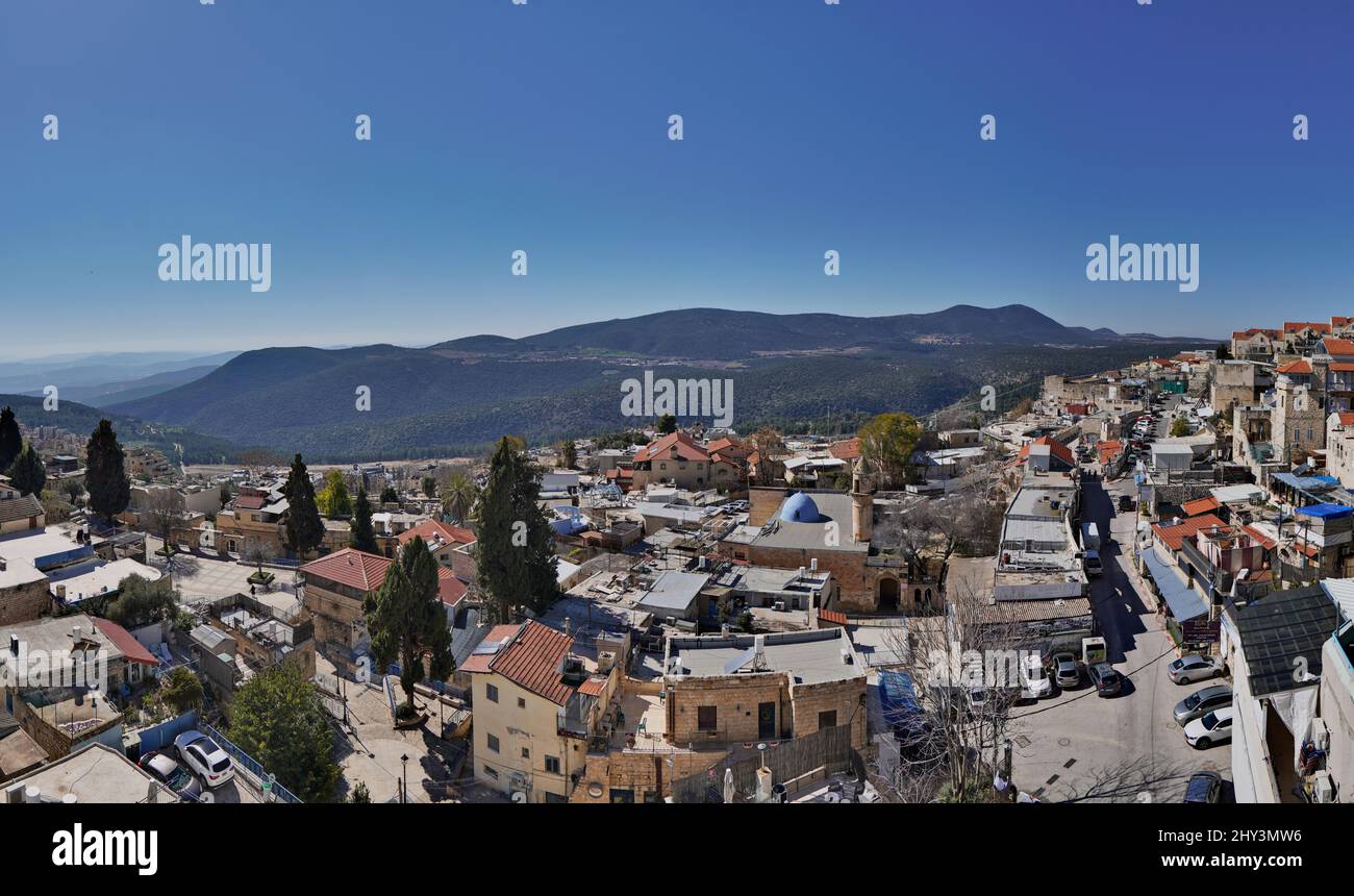 Panoramic aerial view of the old city of Safed, with the Galilee mountains on the background, Israel Stock Photo