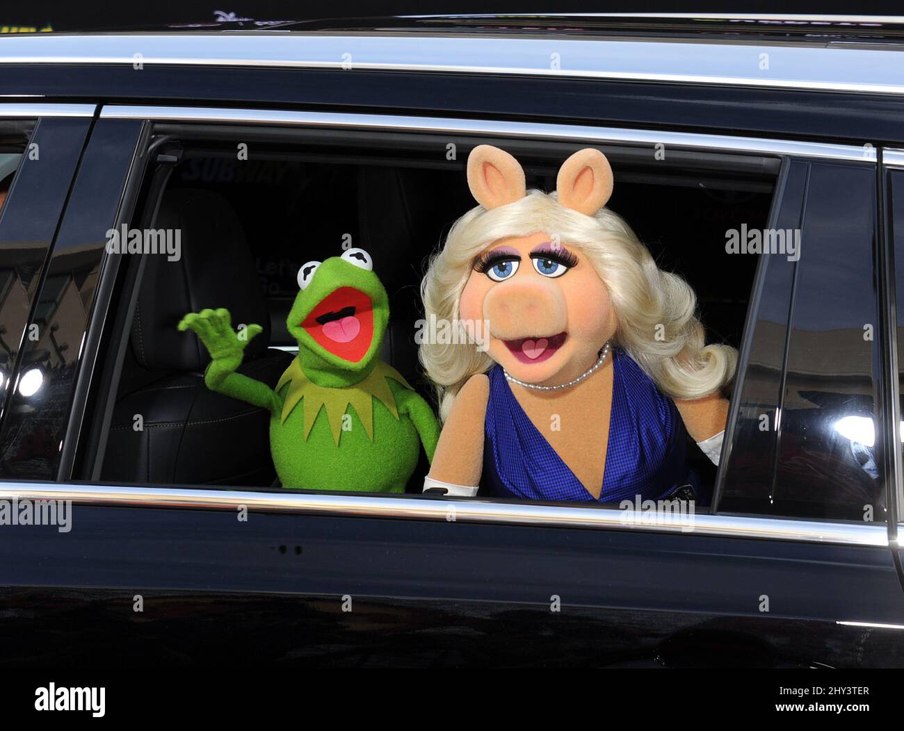 Kermit the Frog & Miss Piggy (The Muppets) attending the Muppets Most Wanted Los Angeles Premiere at the El Capitan theatre Stock Photo