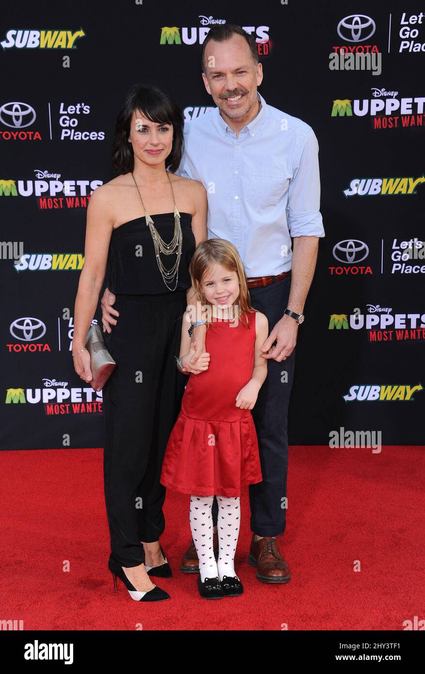 Constance Zimmer, Russ Lamoureux & Colette Lamoureux attending the Muppets Most Wanted Los Angeles Premiere at the El Capitan theatre Stock Photo