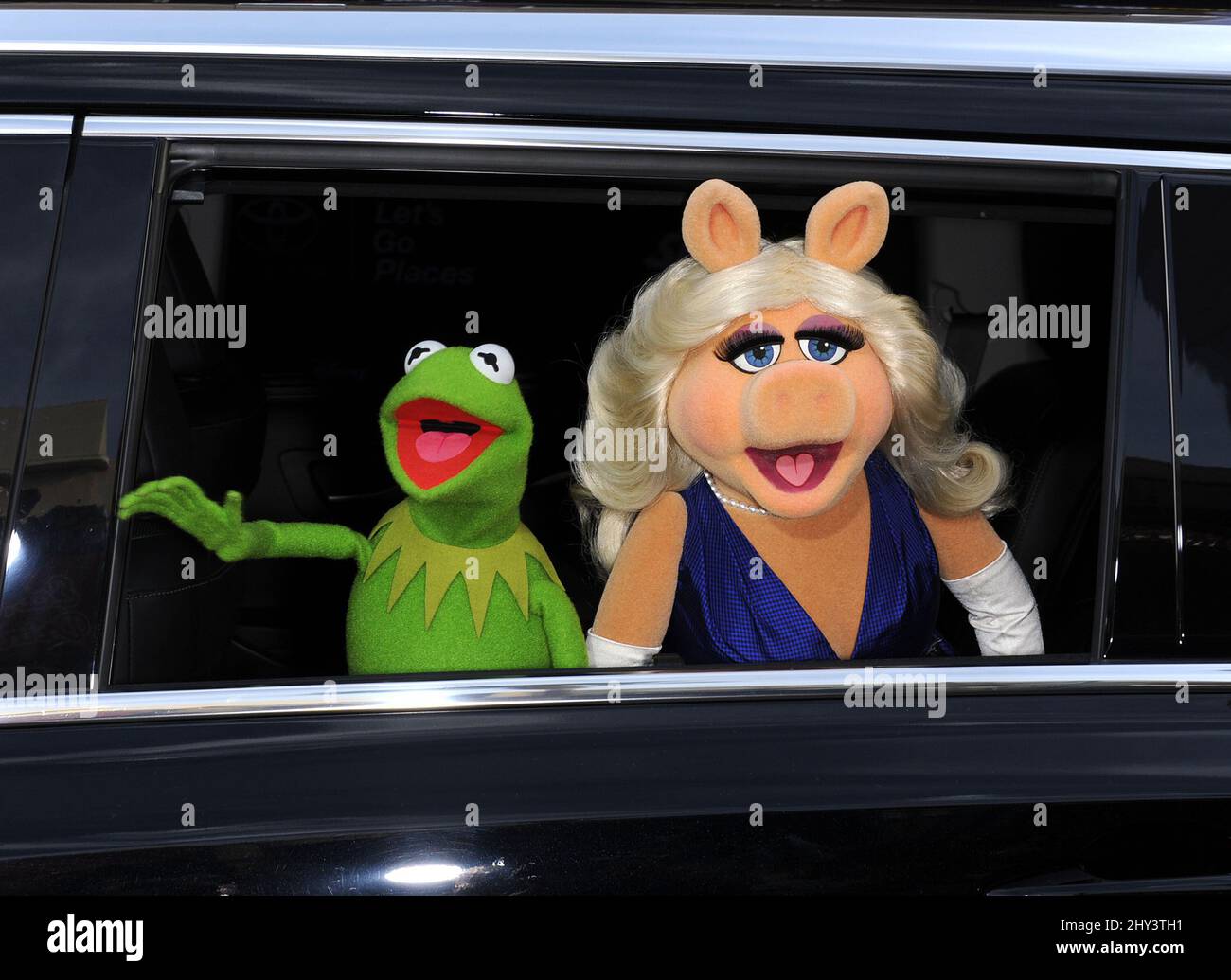 Kermit the Frog & Miss Piggy (The Muppets) attending the Muppets Most Wanted Los Angeles Premiere at the El Capitan theatre Stock Photo