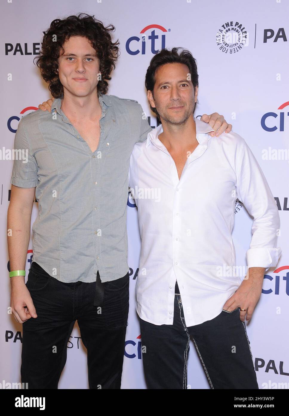 Henry Ian Cusick & Eli Cusick arrives for the Lost 10th Anniversary Reunion event during the 31st Annual PaleyFest held at the Dolby Theatre, Hollywood, Los Angeles. Stock Photo