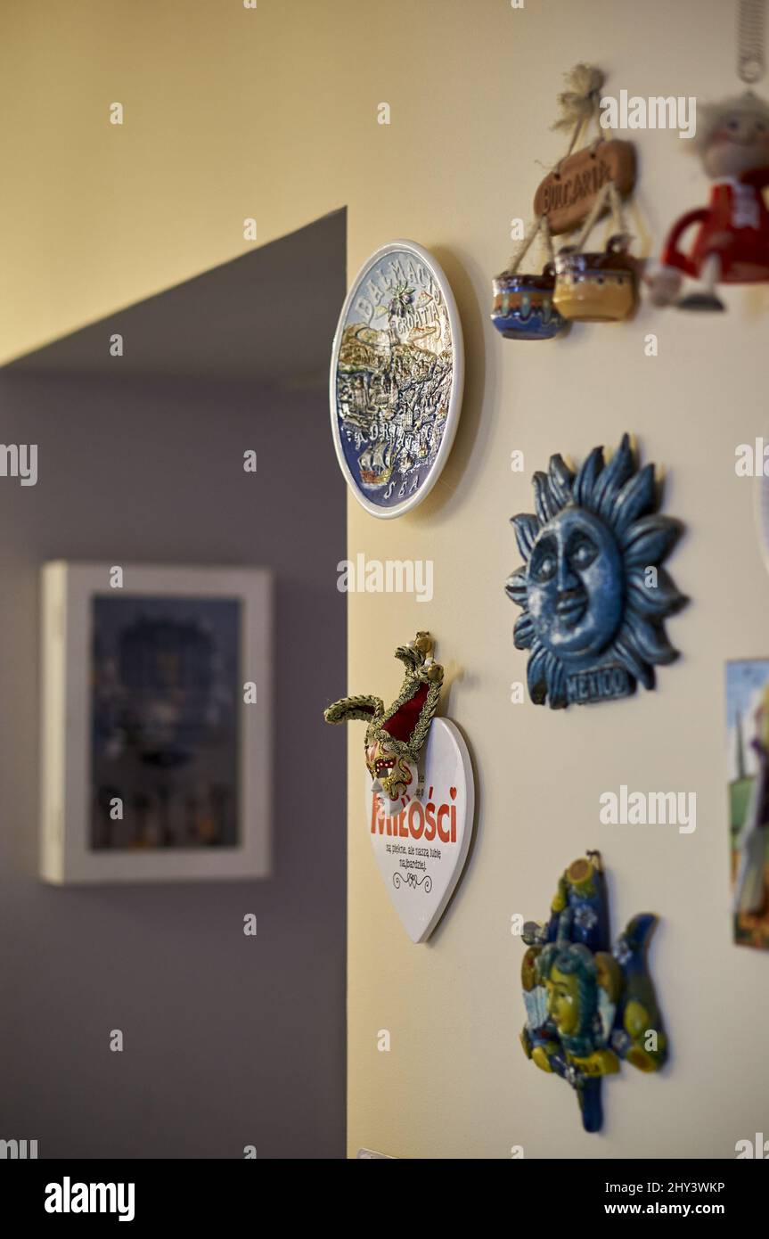 Vertical closeup of the ornaments from different countries hanging on a