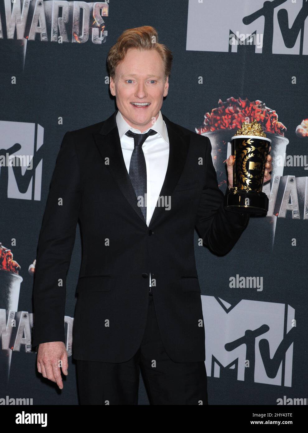 Conan O'Brien attending the press room of the 2014 MTV Movie awards in