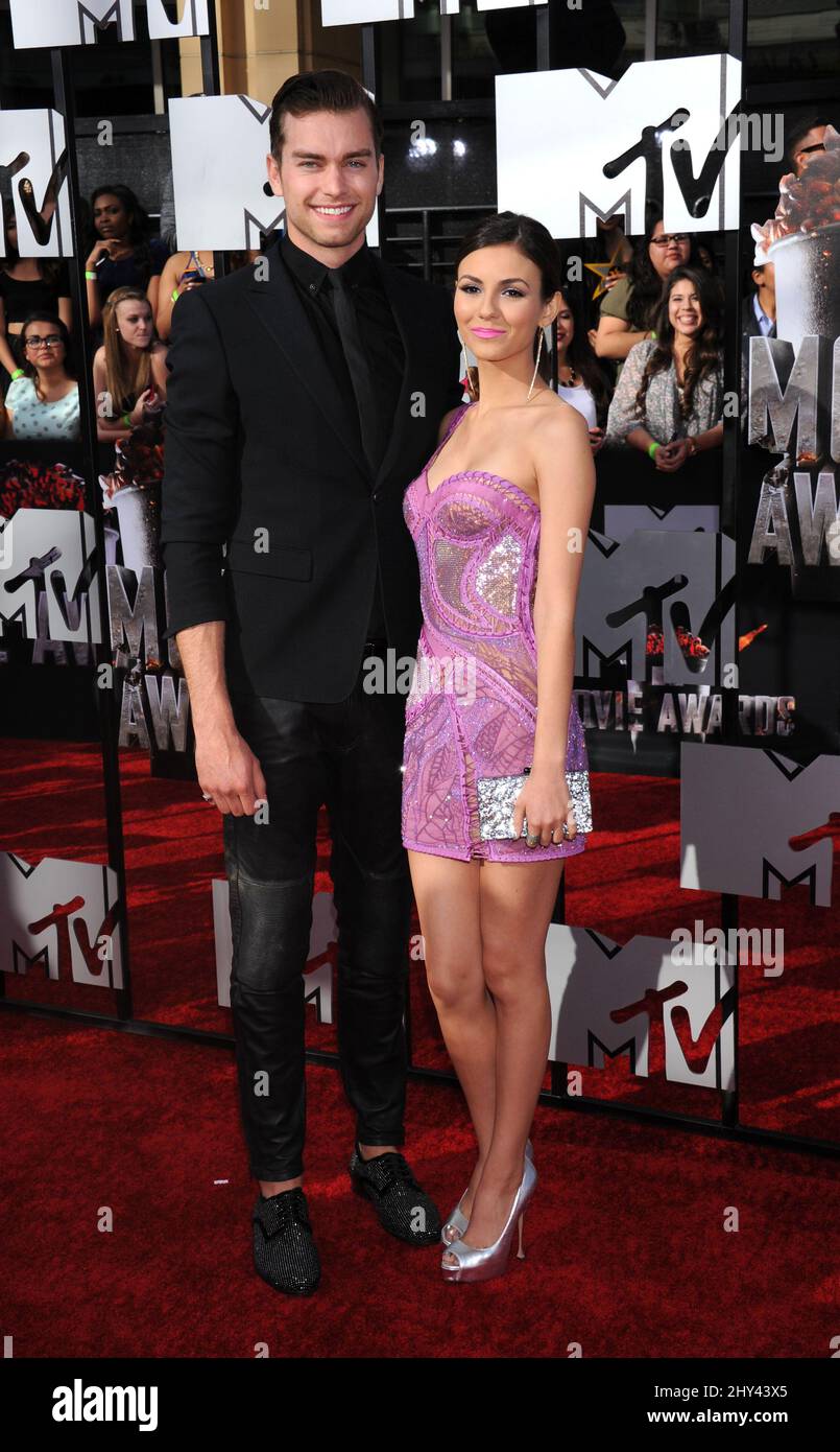 Victoria Justice and Pierson Fode attending the MTV Movie awards 2014