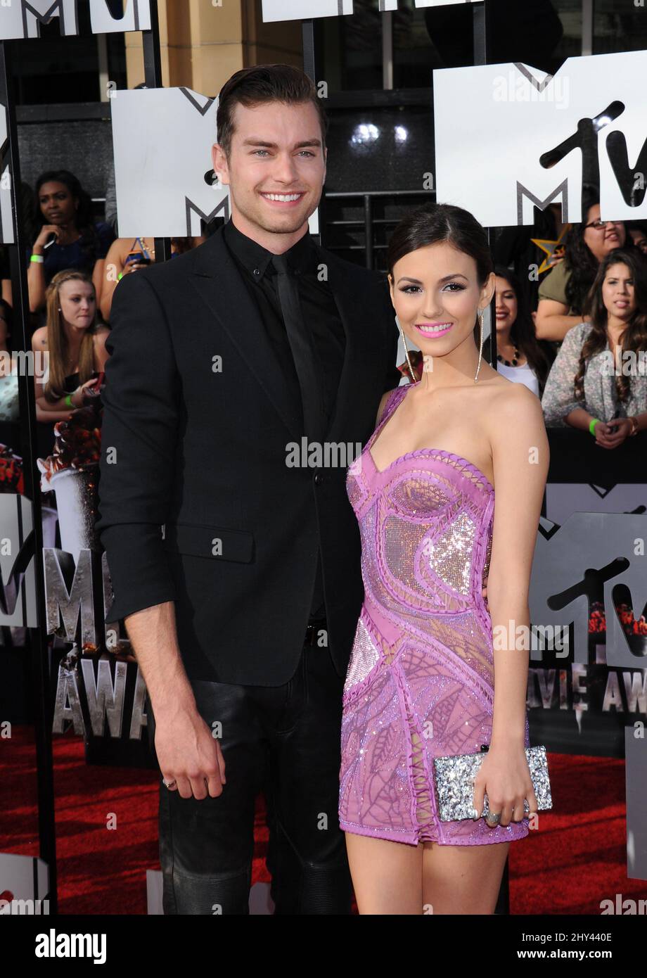 Victoria Justice and Pierson Fode attending the MTV Movie awards 2014