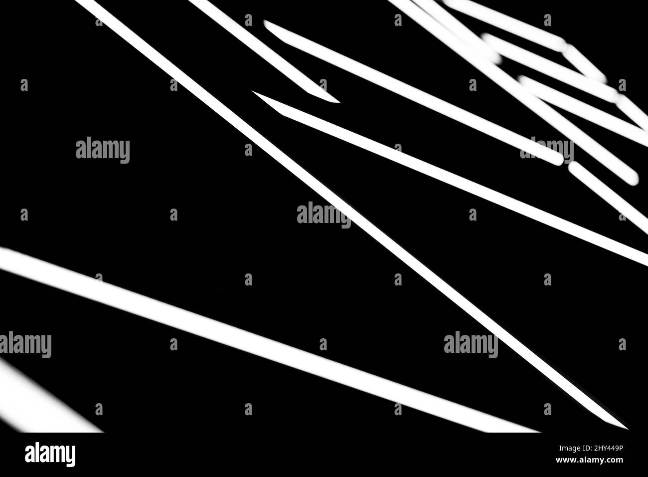 White abstract lines isolated on a black background Stock Photo - Alamy