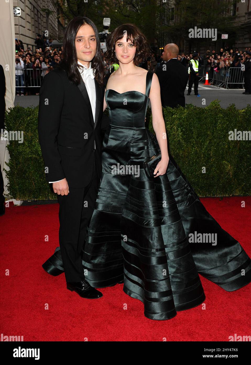 Felicity Jones & Olivier Theyskens arriving at the Costume Institute