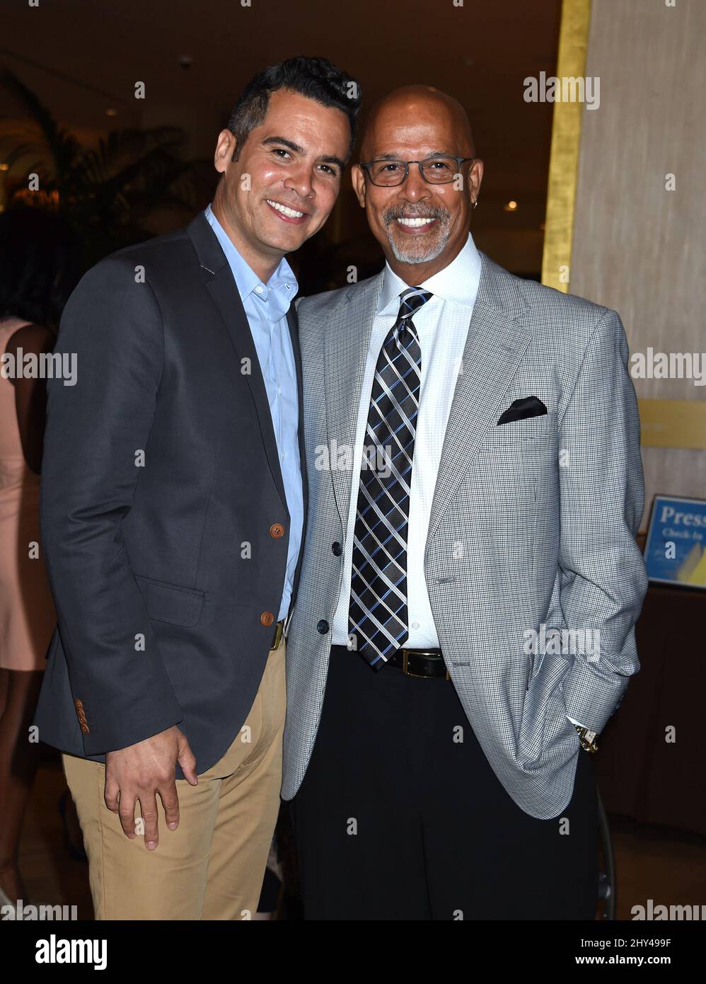 Cash Warren and Michael Warren attends the Helping Hand Mother's Day Luncheon held at the Beverly Hilton Hotel, Beverly Hills, May 9 2014. Stock Photo