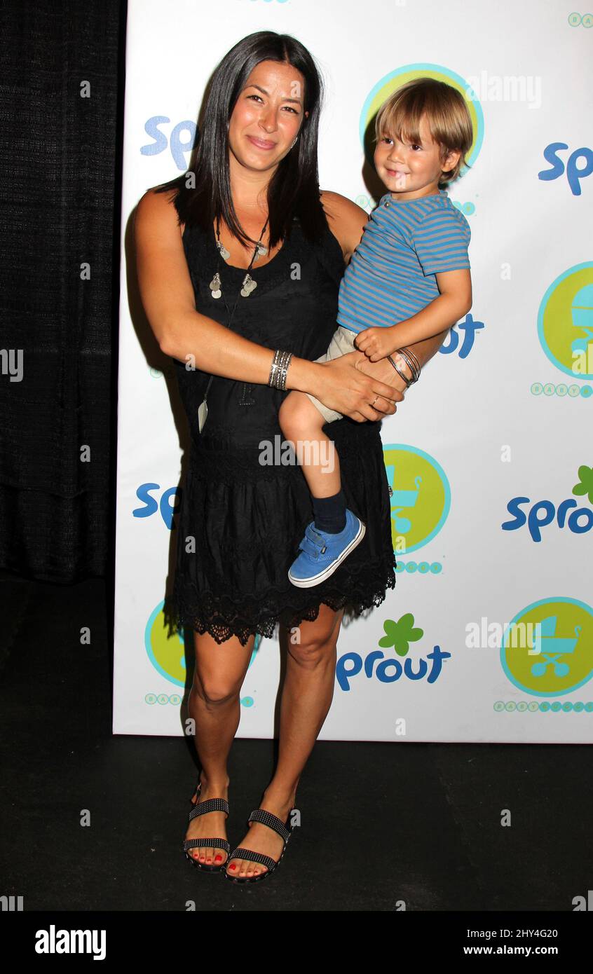 Rebecca Minkoff and son Luca Shai attending the 2014 Baby Buggy Bedtime(01)