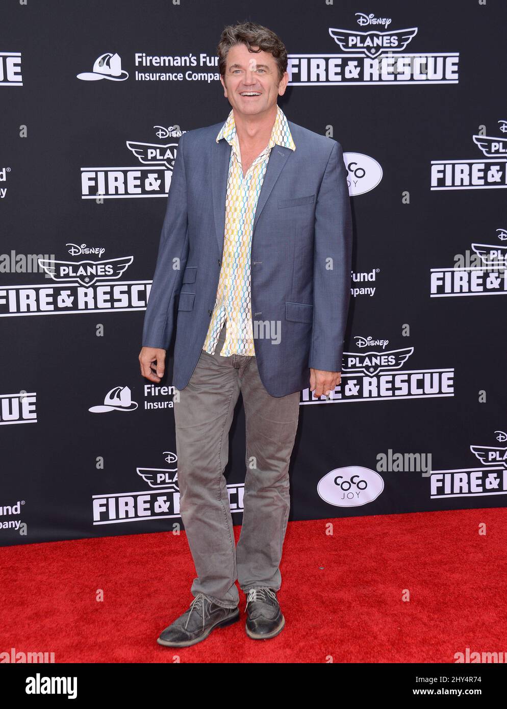 John Michael Higgins attending the premiere of 'Planes Fire & Rescue