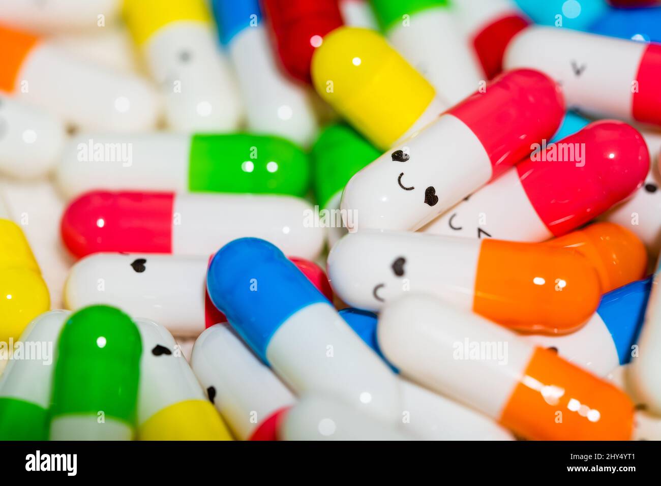 Capsules with faces hi-res stock photography and images - Alamy