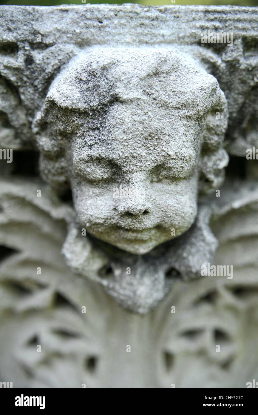 Stone face monument in a garden in Missouri Stock Photo - Alamy