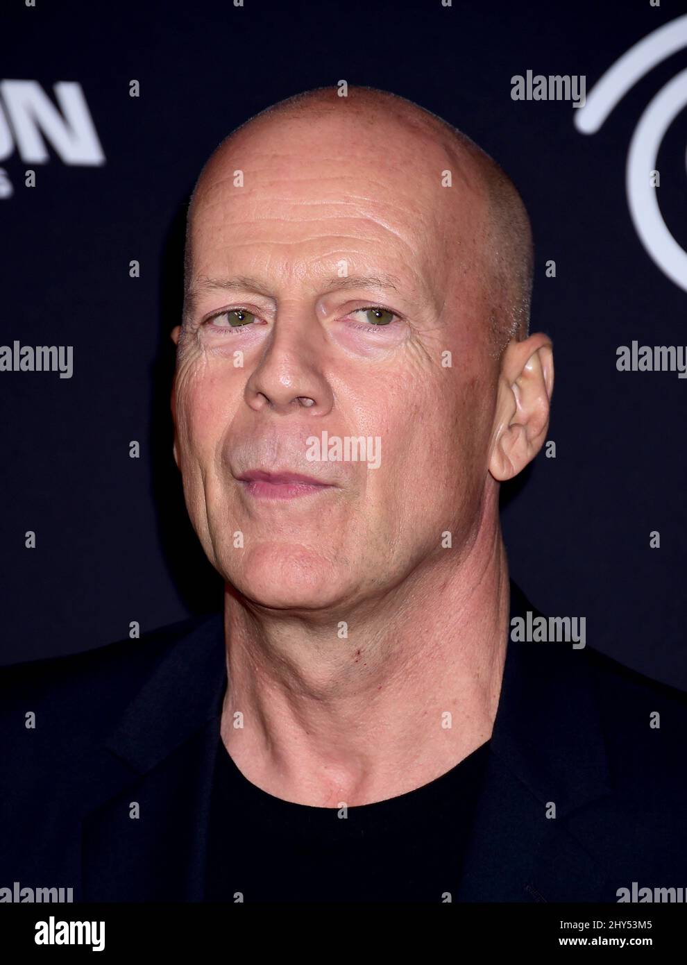 Bruce Willis attending the premiere of 'Sin City: A Dame To Kill For' in Los Angeles Stock Photo