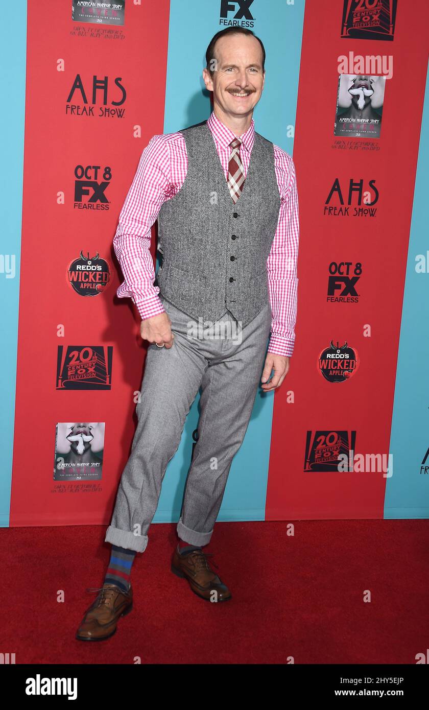 Denis O'Hare attends the "American Horror Story: Freak Show" Season Premiere at the Chinese Theatre Stock Photo