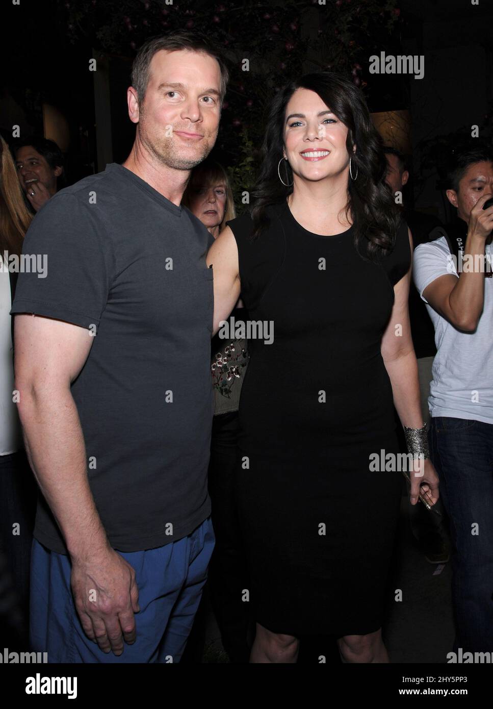 Peter Krause & Lauren Graham, attending the 100th Episode of Parenthood at Universal Studios in Hollywood, California. Stock Photo
