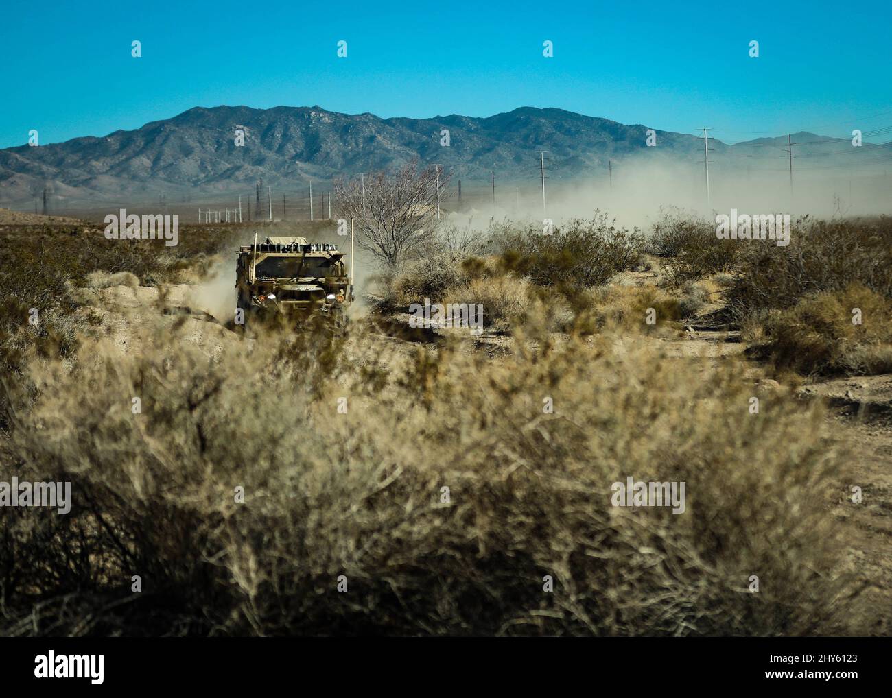 Green Berets with the 5th Special Forces Group (Airborne), maneuver a