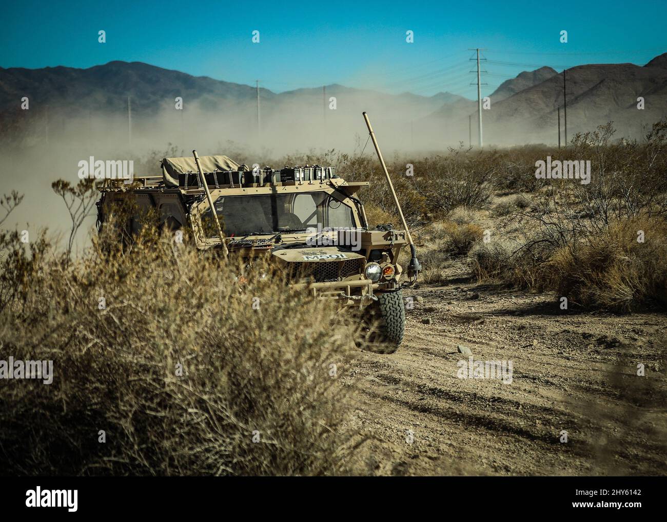 Green Berets with the 5th Special Forces Group (Airborne), maneuver a