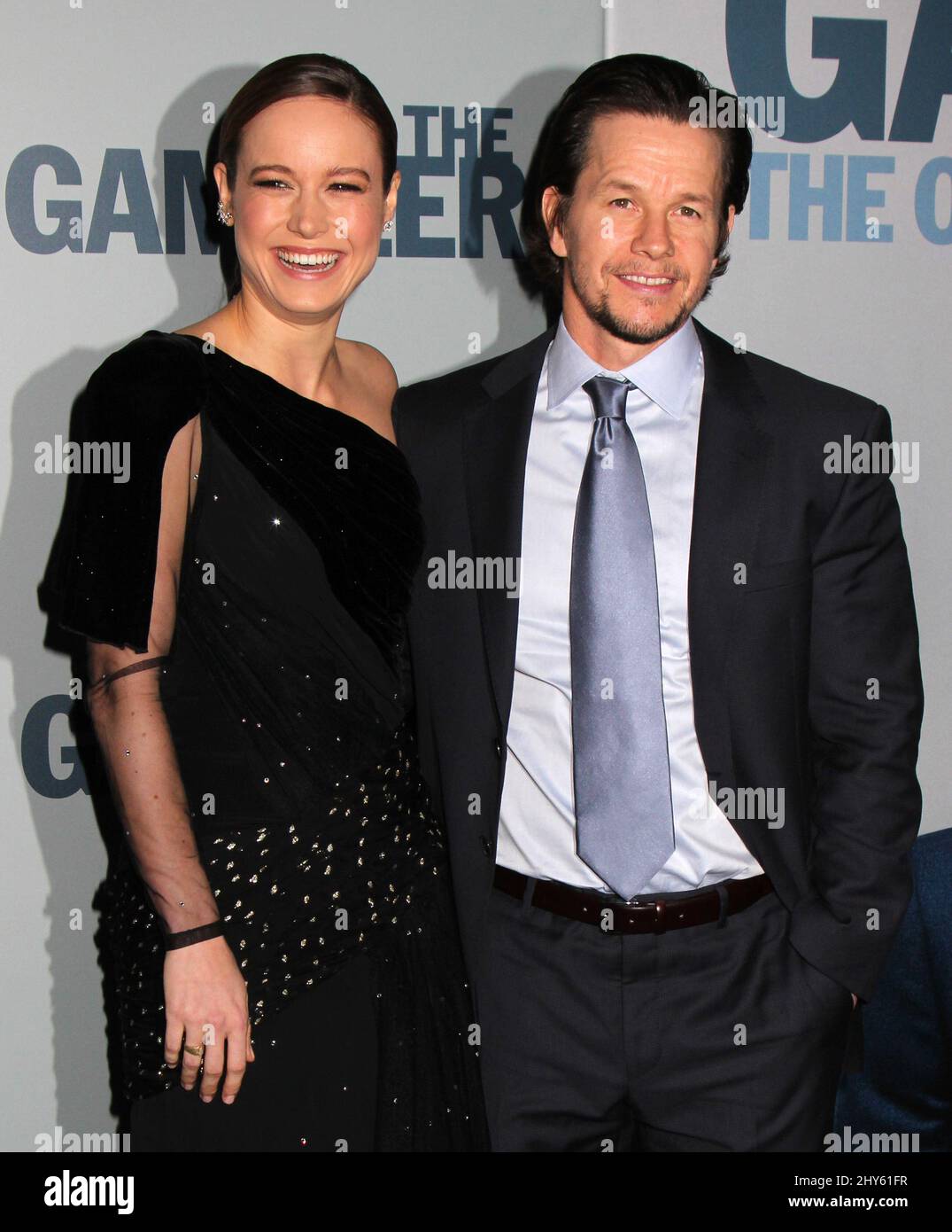 Brie Larson and Mark Wahlberg attending the premiere of "The Gambler