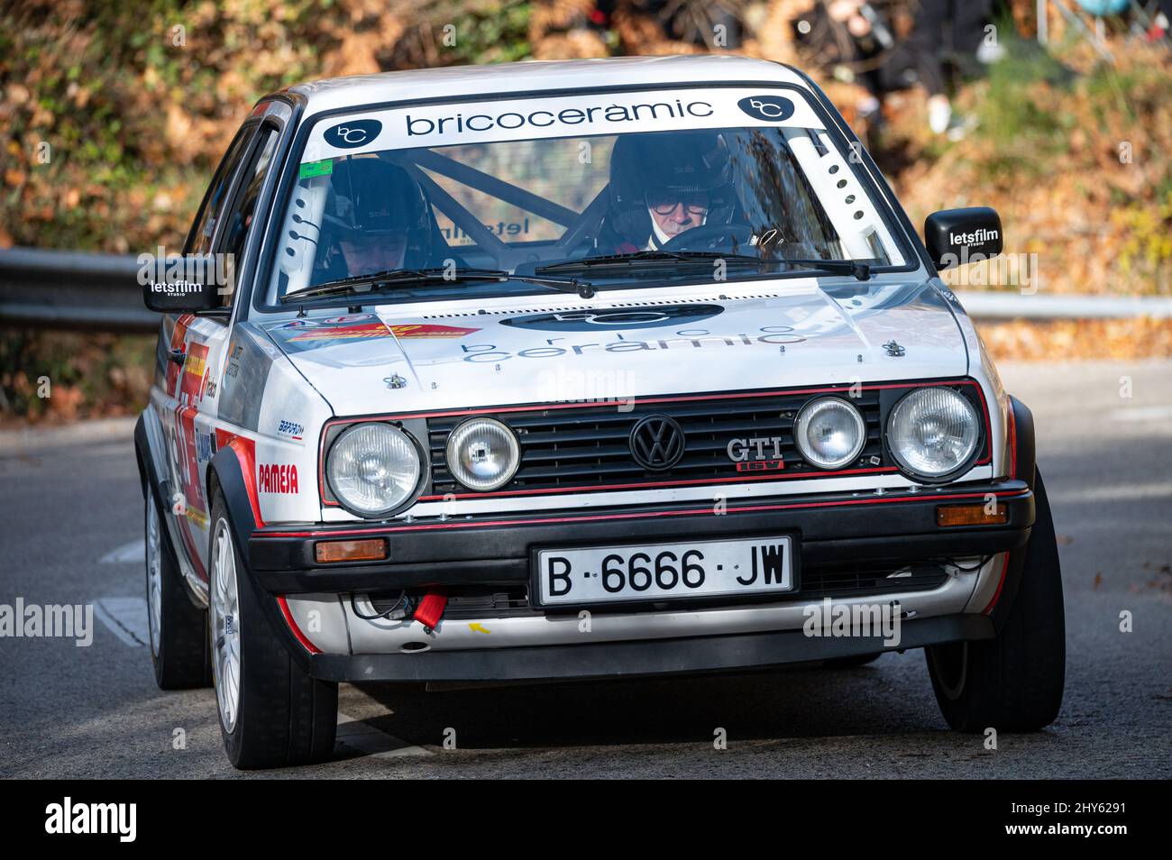 White Volkswagen Golf GTI MKII rally car driving during the 69th