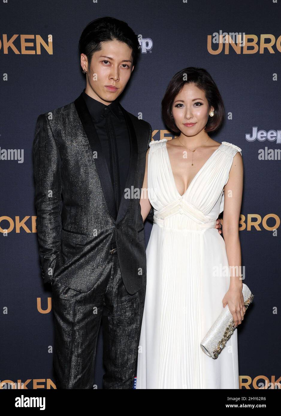 Takamasa Ishihara (Miyavi) & Melody Miyuki Ishikawa attending the 'Unbroken' Premiere in Los Angeles Stock Photo