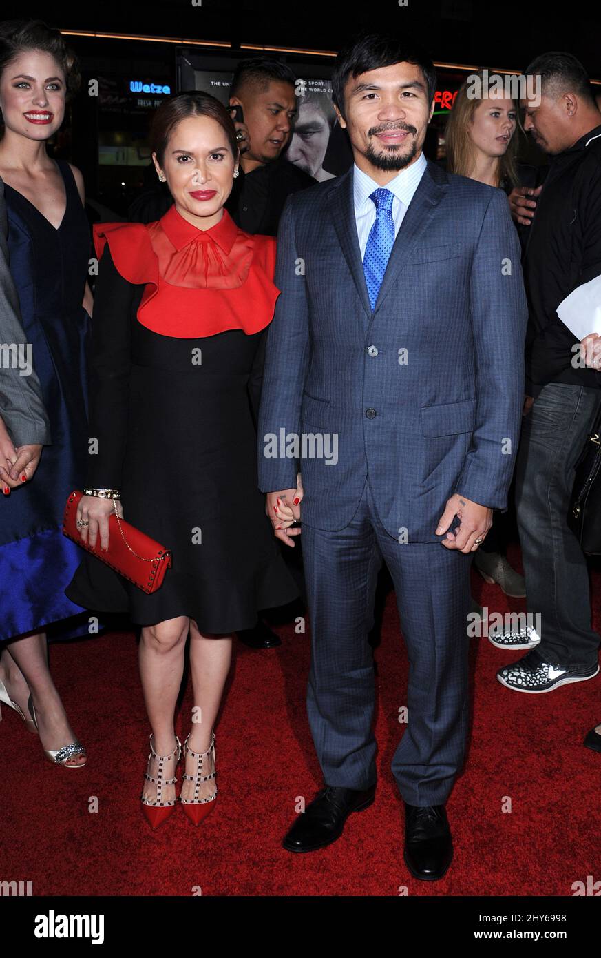 Manny Pacquiao, Jinkee Pacquiao arriving for the Manny premiere held at TCL Chinese Theater, Los Angeles. Stock Photo