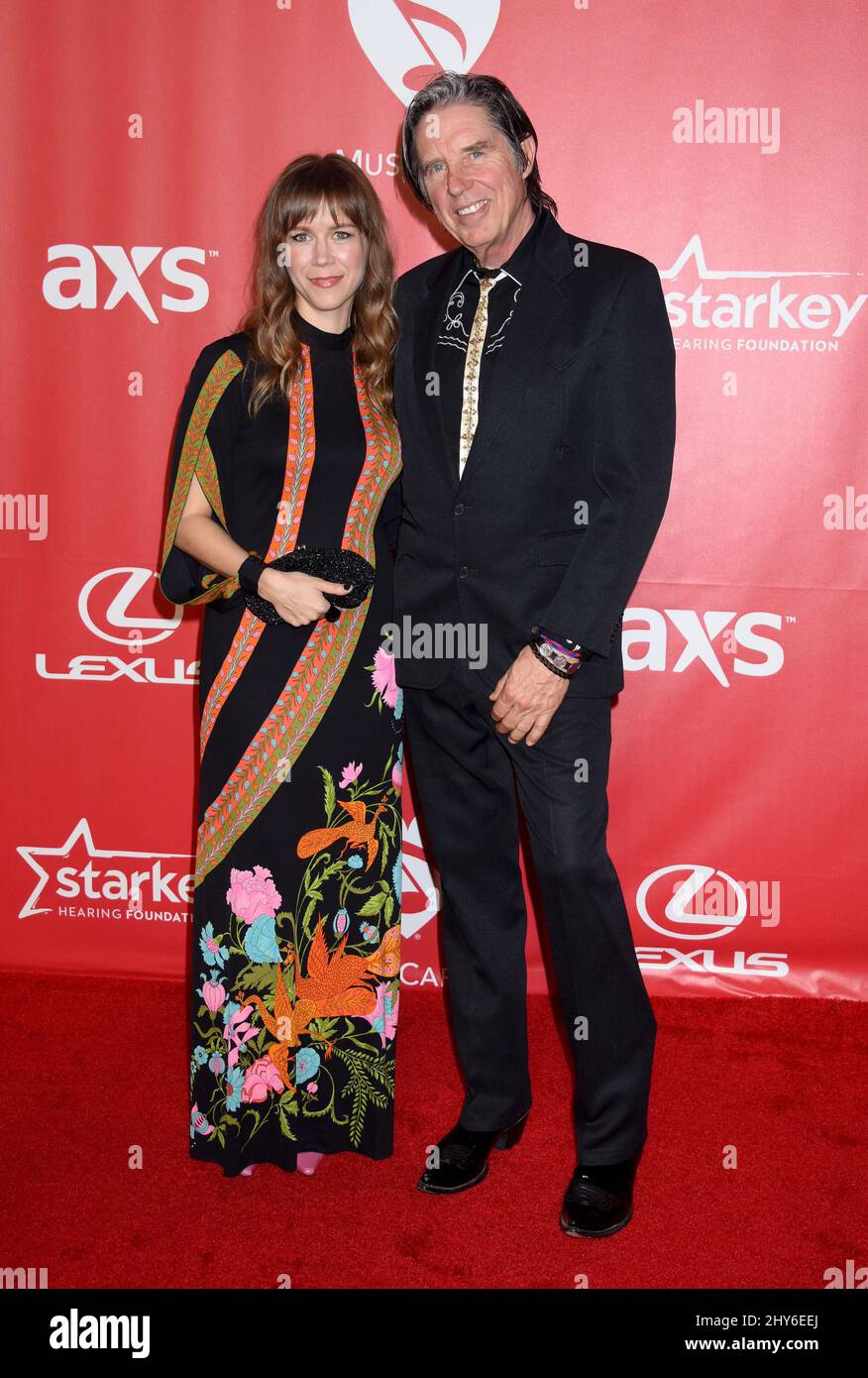 John Doe and Gigi Blair attending the 2015 MusiCares Person of the Year Gala honoring Bob Dylan, at the Los Angeles Convention Center in Los Angeles, California. Stock Photo