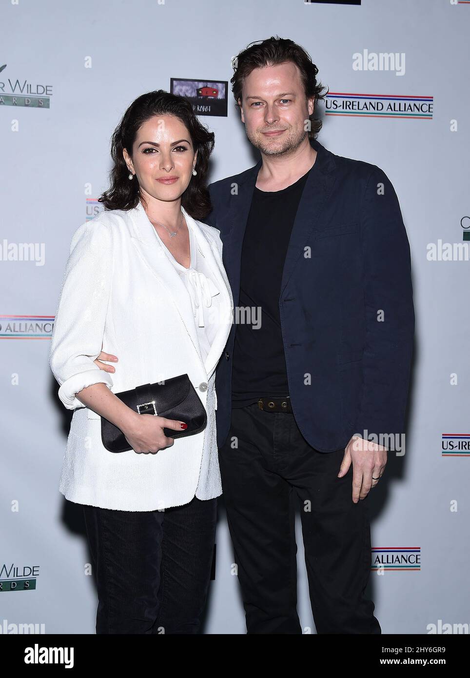 Sonya Macari & Colin Devlin attending the US-Ireland Alliance Pre-Academy  Awards Event honouring Stephen Colbert, Carrie Fisher and artist Colin  Davidson at JJ Abrams??? BAD ROBOT studio, in Santa Monica, California Stock