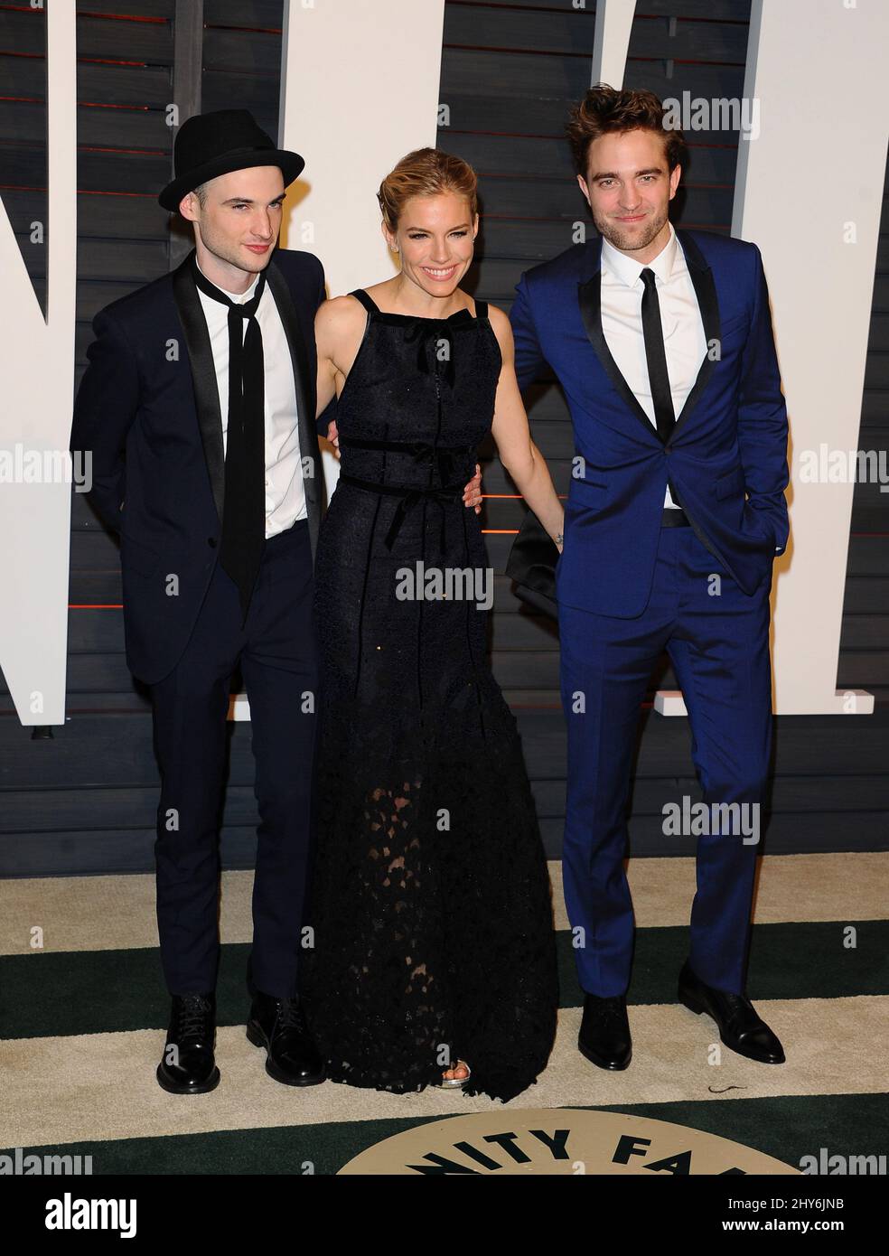 Tom Sturridge, Sienna Miller and Robert Pattinson attending the Vanity ...