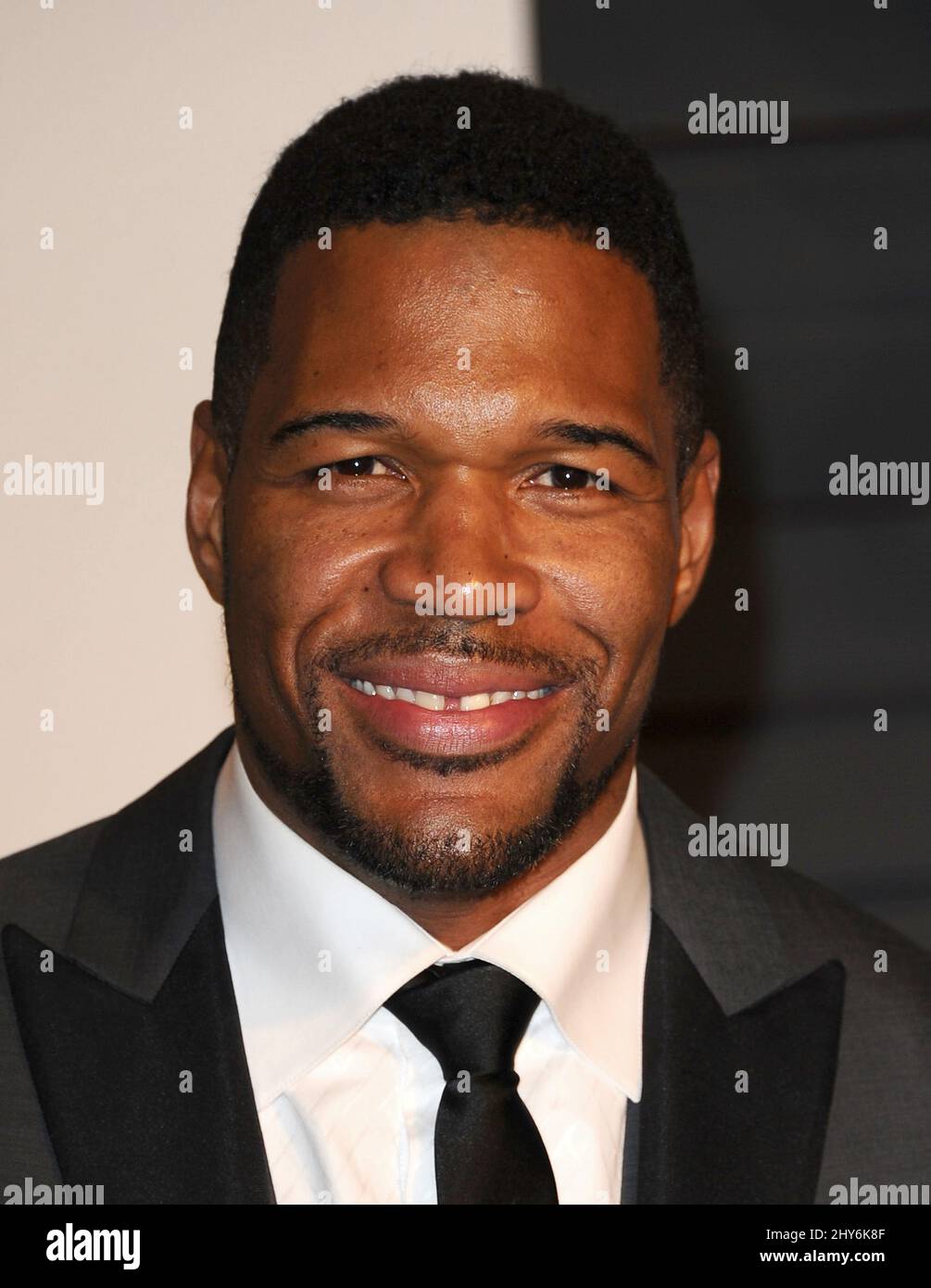 Michael Strahan arrives at the 2015 Vanity Fair Oscar Party Stock Photo