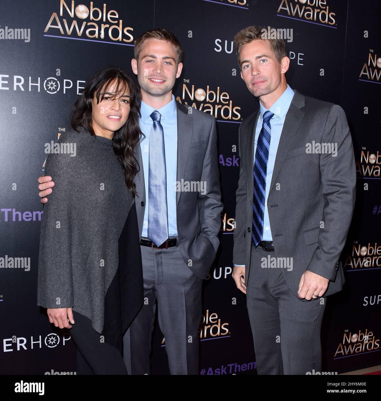Michelle Rodriguez, Cody Walker, Caleb Walker attending the The 3rd