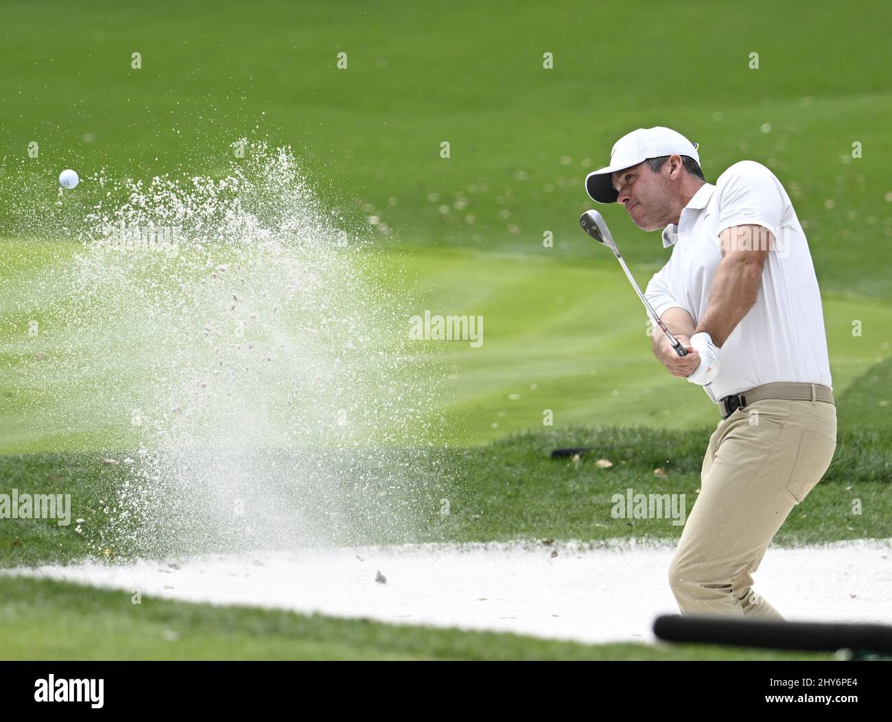 Ponte Vedra Beach, United States. 14th Mar, 2022. Paul Casey of England hits out of a bunker in the final round of the 2022 Players PGA Championship on the Stadium Course at TPC Sawgrass in Ponte Vedra Beach, Florida on Monday, March 14, 2022. Cameron Smith of Australia won the championship with a score of 13 under par. Photo by Joe Marino/UPI Credit: UPI/Alamy Live News Stock Photo