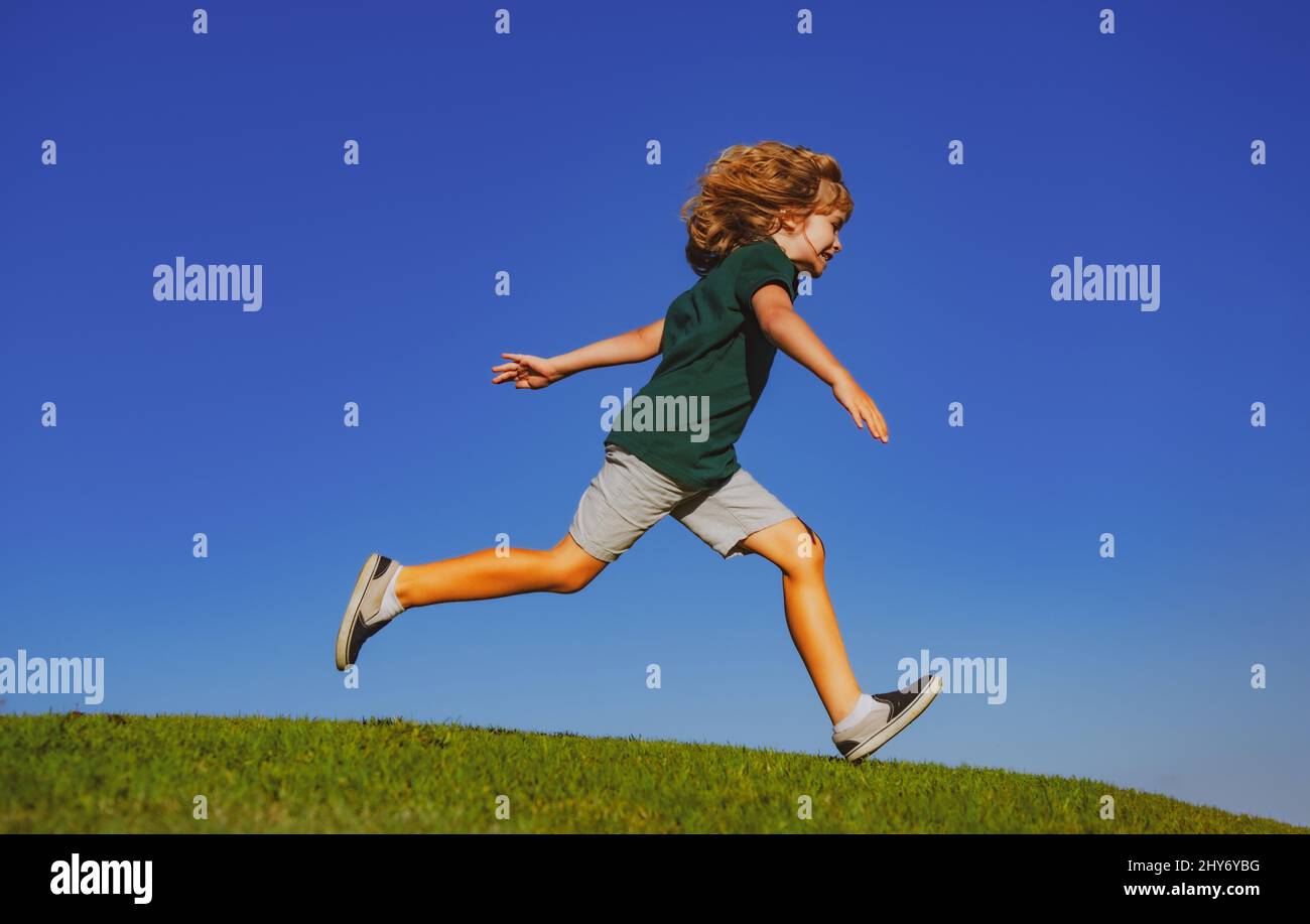 Little cute boy running on grass. Kids exploring nature, summer. Active ...