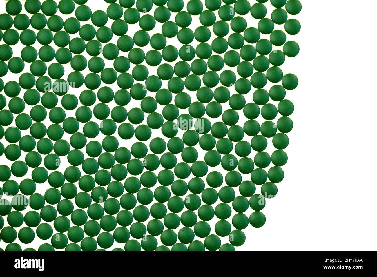 Chlorella algae green tablets on white background.Super food. seaweed