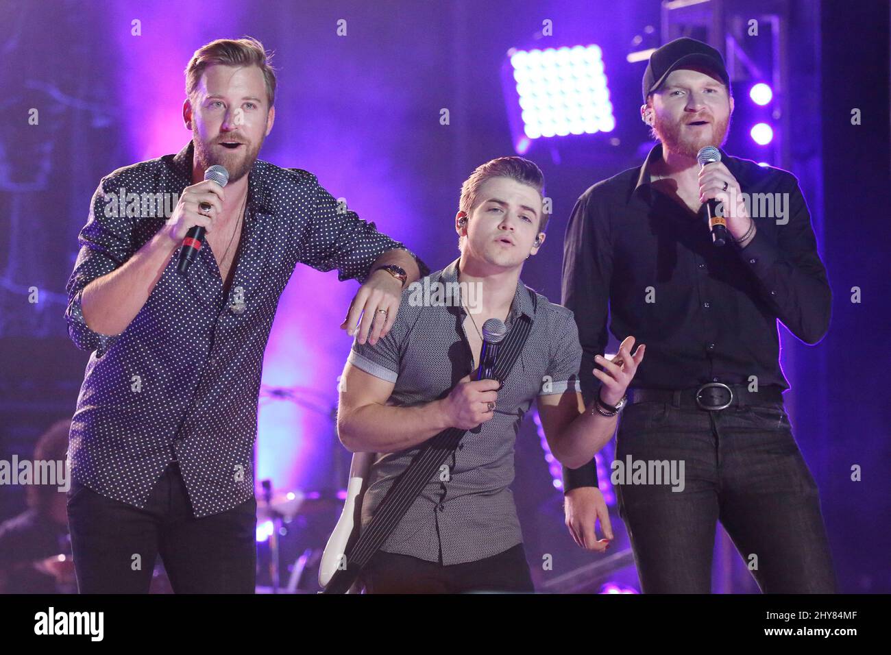 Cole Swindell,Hunter Hayes,Charles Kelley,Lady Antebellum performing during the Pre-CMA Street Jam held at the Bridgestone Arena Plaza in Nashville, USA. Stock Photo