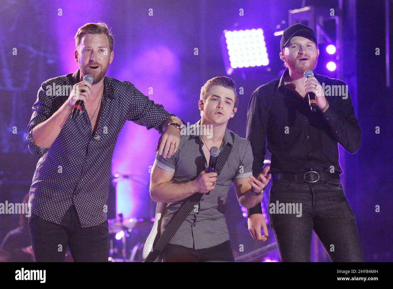 Cole Swindell,Hunter Hayes,Charles Kelley,Lady Antebellum performing during the Pre-CMA Street Jam held at the Bridgestone Arena Plaza in Nashville, USA. Stock Photo