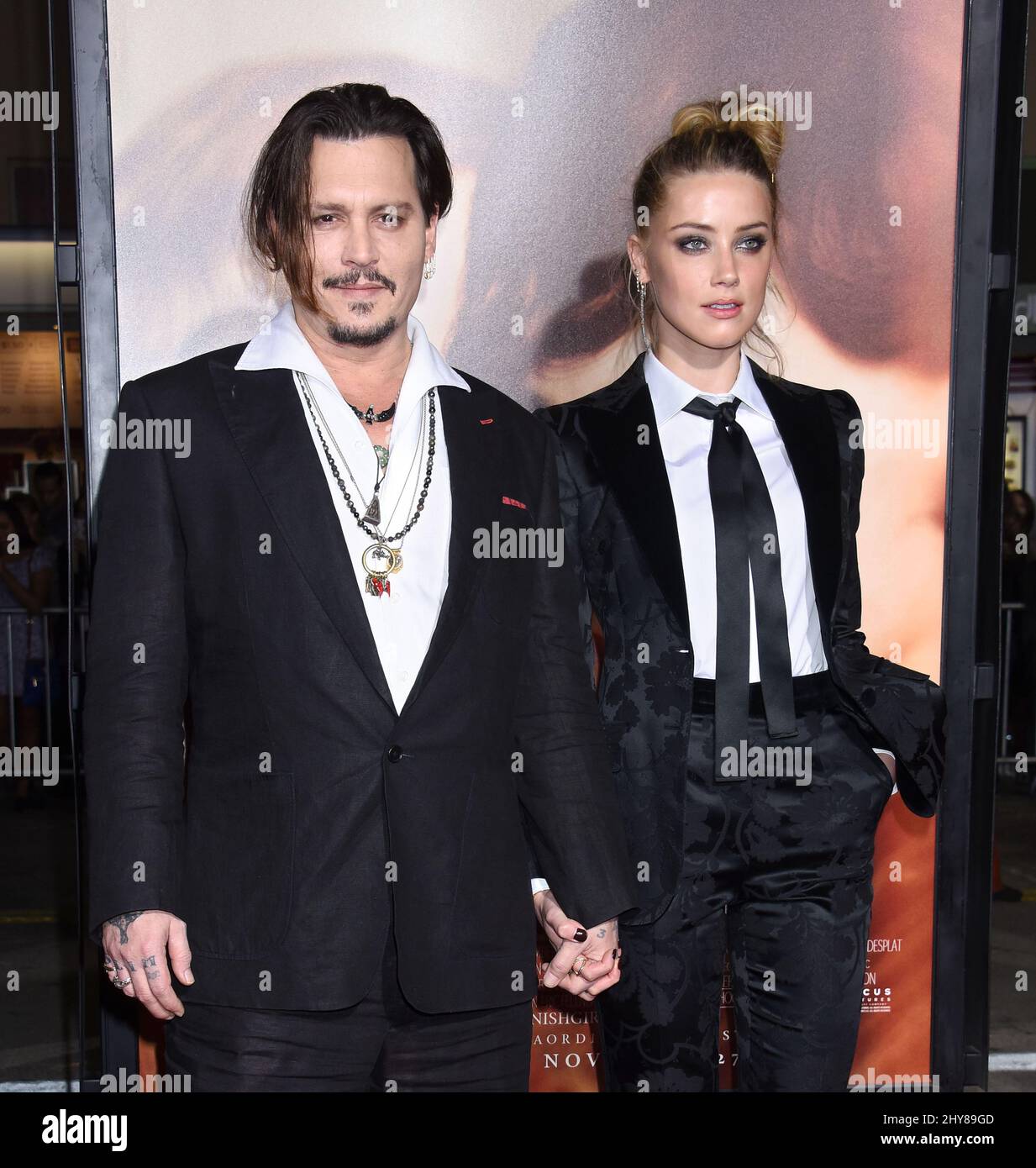 Johnny Depp and Amber Heard arrives at the premiere of 'The Danish Girl' at Regency Village Theatre on Saturday, Nov. 21, 2015 in Los Angeles. Stock Photo