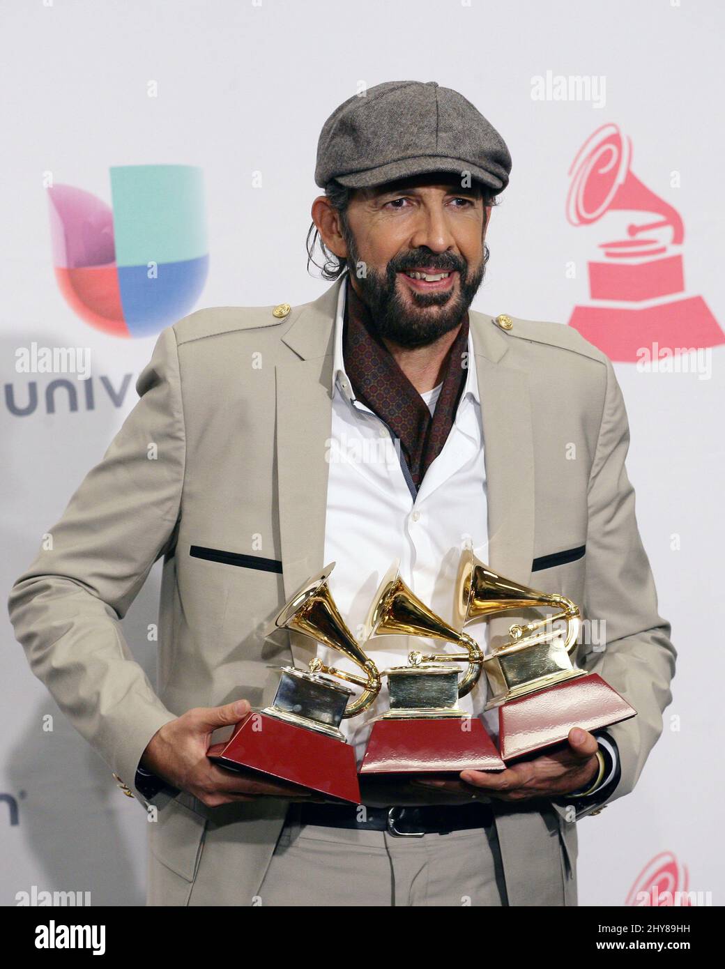 Juan Luis Guerra poses in the press room at the 16th annual Latin Grammy Awards at the MGM Grand Garden Arena on Thursday, Nov. 19, 2015, in Las Vegas.. Stock Photo