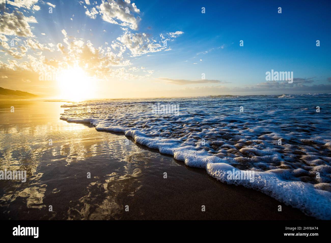 Blue sky reflected in wet sand hi-res stock photography and images - Alamy