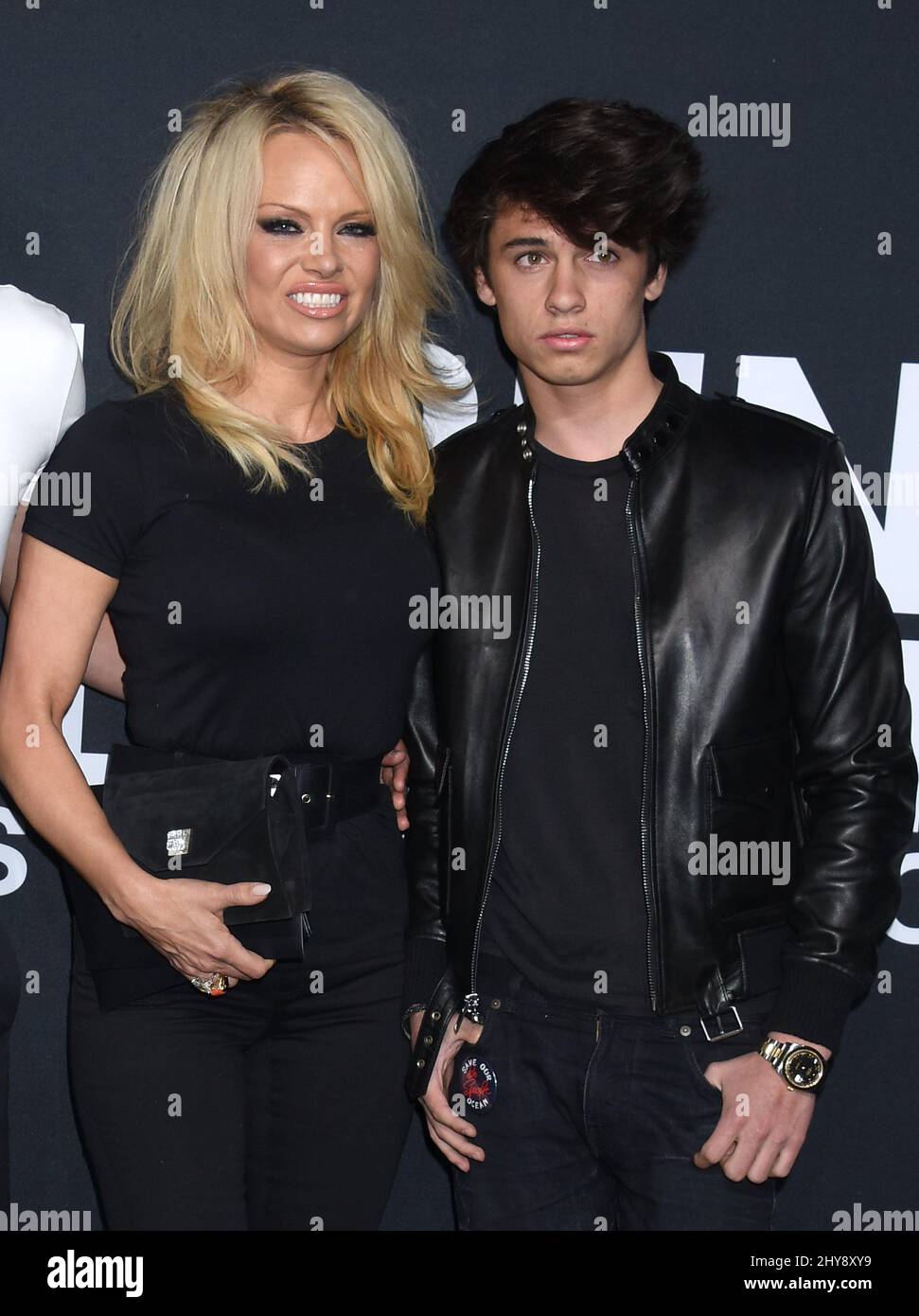 Brandon Thomas Lee, Pamela Anderson and Dylan Jagger Lee attending the  Saint Laurent event held at the Hollywood Palladium in Los Angeles,  California Stock Photo - Alamy