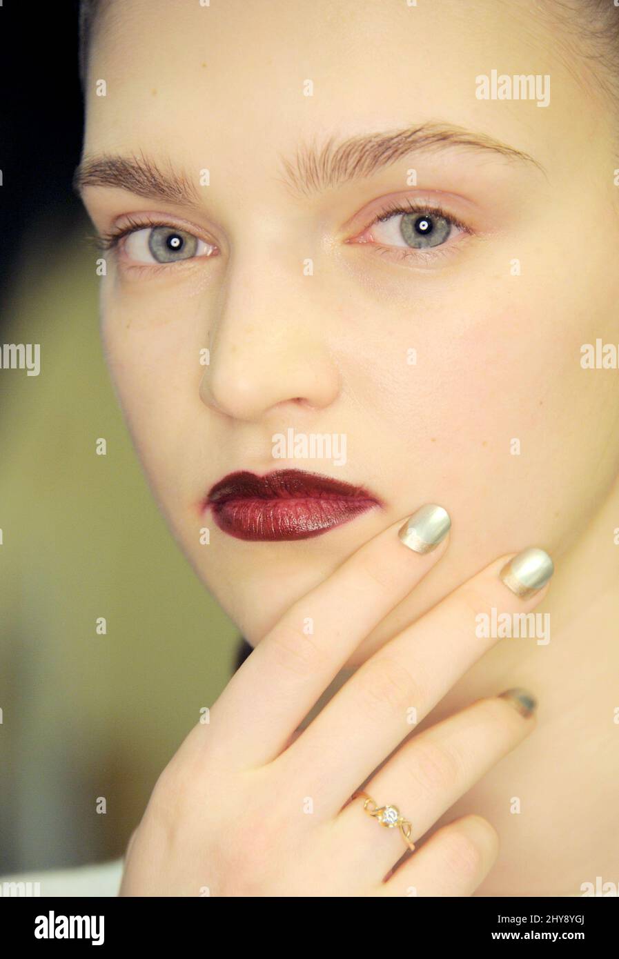 Model with Morgan Taylor Nails attending the Creatures of the Wind Fall 2016 Collection held at the Masonic Lodge in New York. Stock Photo