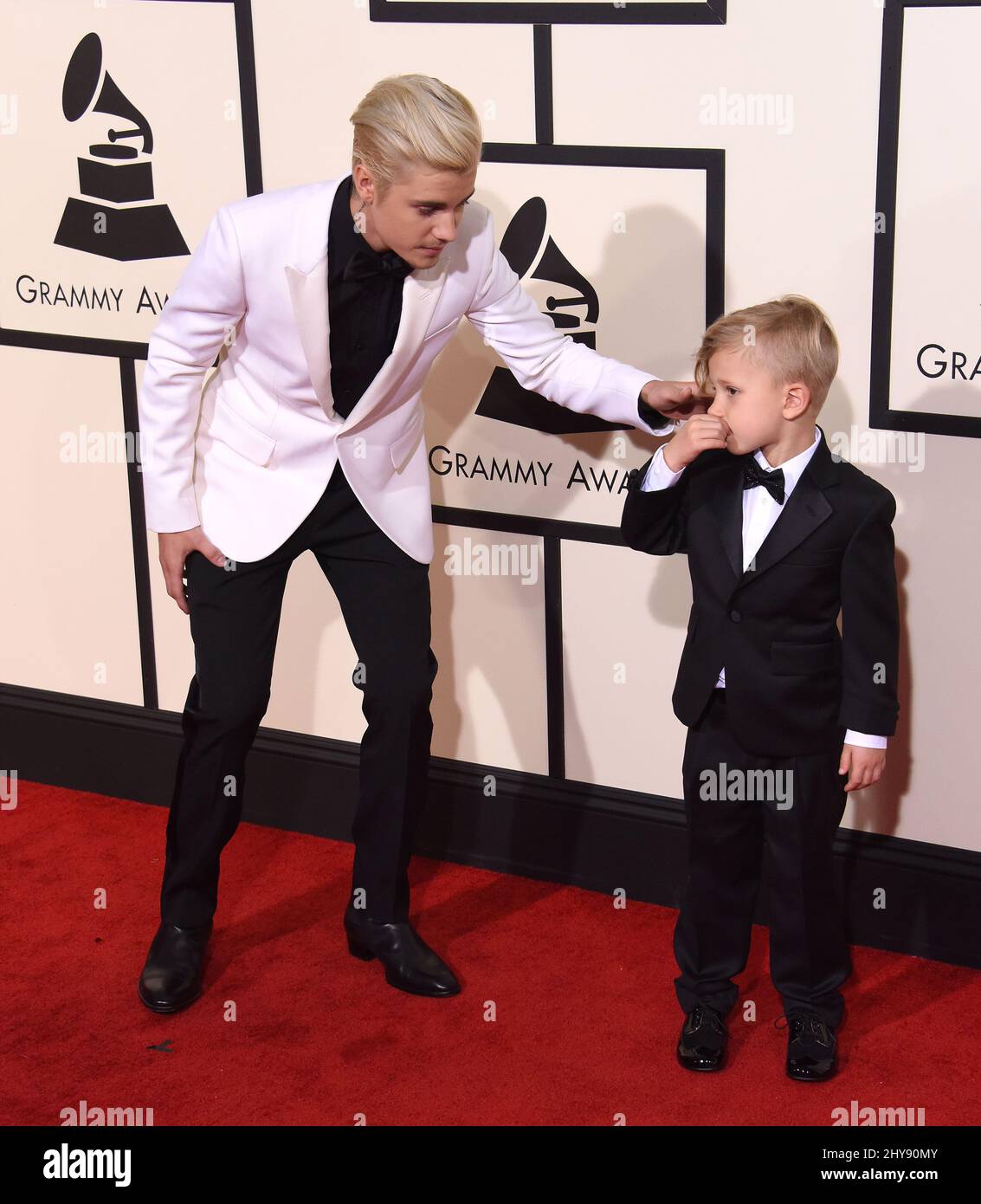 Justin Bieber, brother Jaxon arriving at the 58th Annual Grammy Awards ...