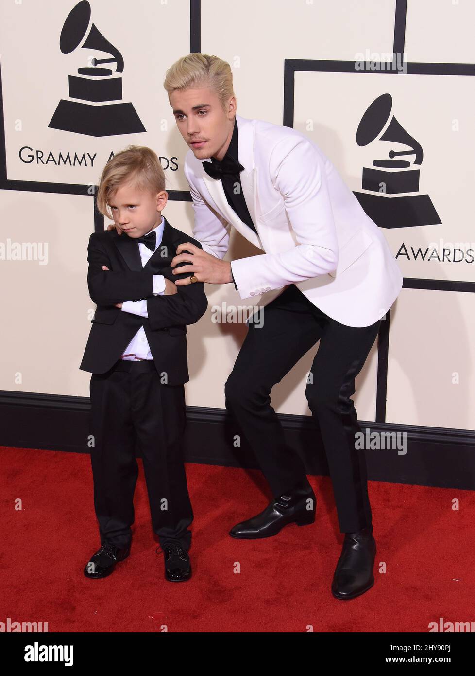 Justin Bieber, brother Jaxon arriving at the 58th Annual Grammy Awards ...