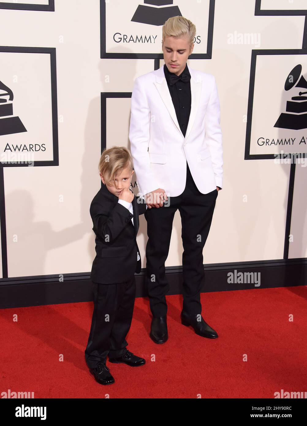 Justin Bieber, brother Jaxon arriving at the 58th Annual Grammy Awards ...