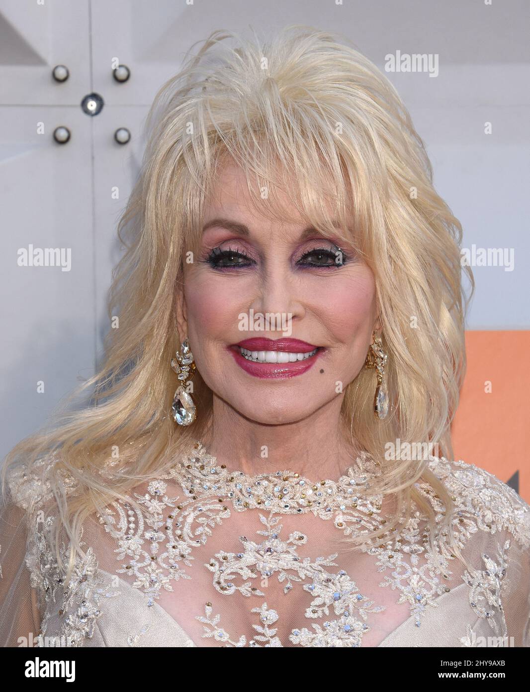 Dolly Parton arrives at the 51st annual Academy of Country Music Awards at the MGM Grand Garden Arena on Sunday, April 3, 2016, in Las Vegas. Stock Photo
