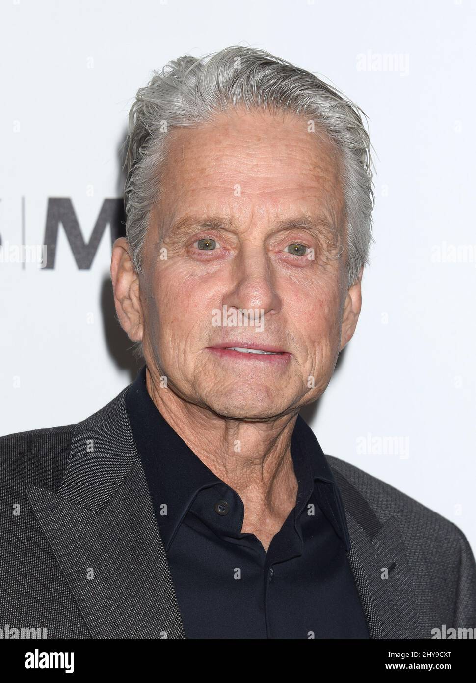 Michael Douglas arrives at the 5th Annual Reel Stories, Real Lives Benefit at Milk Studios on Thursday, April 7, 2016, in Los Angeles. Stock Photo