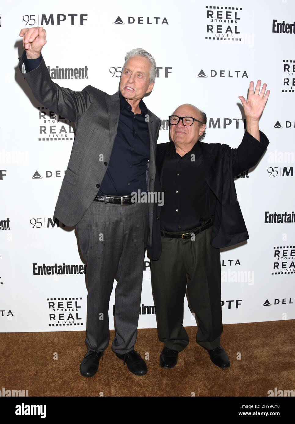 Michael Douglas and Danny DeVito arrives at the 5th Annual Reel Stories, Real Lives Benefit at Milk Studios on Thursday, April 7, 2016, in Los Angeles. Stock Photo