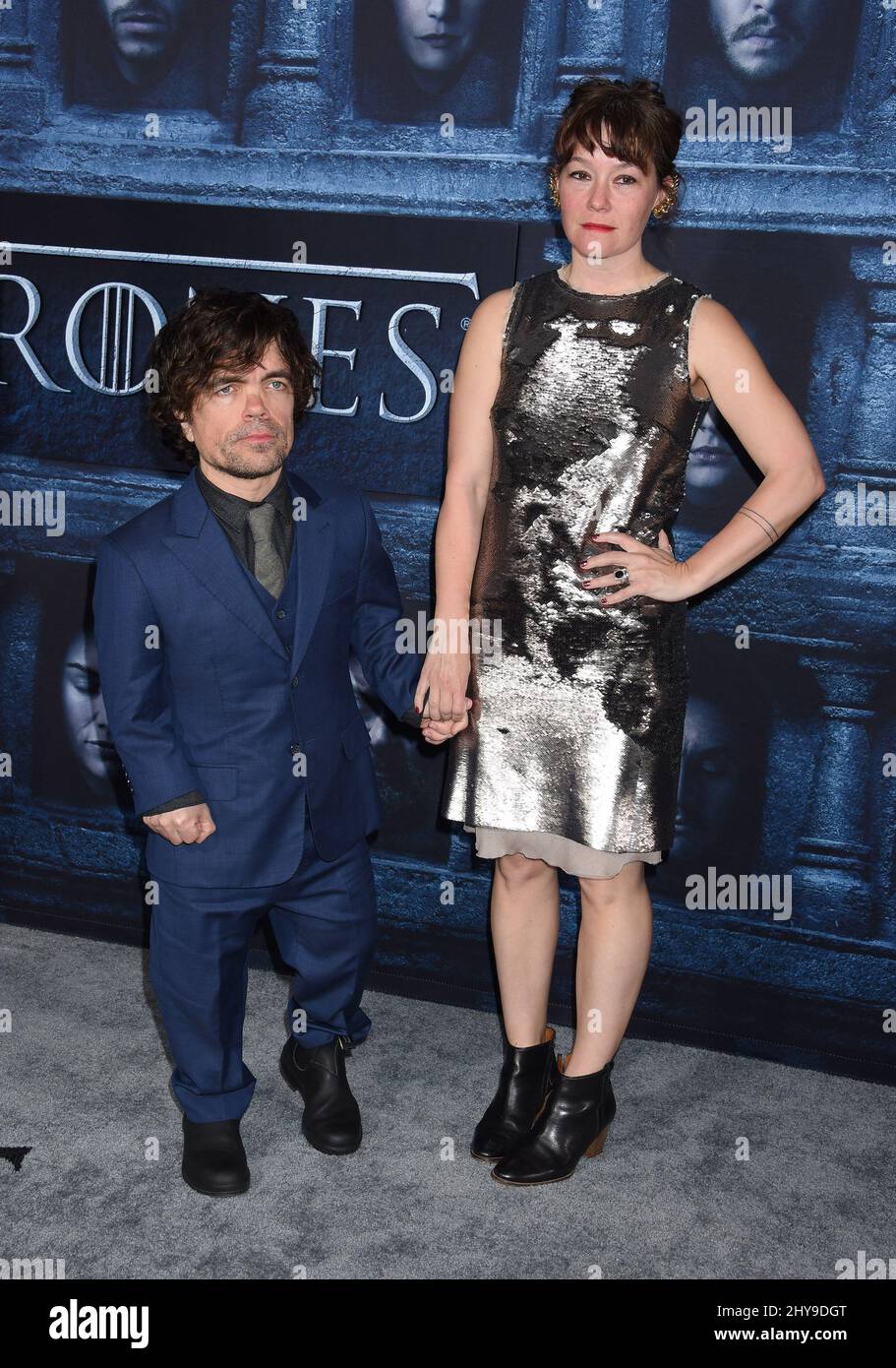 Peter Dinklage and Erica Schmidt attending HBO's 'Game of Thrones' season 6 premiere held at TCL Chinese Theatre in Los Angeles, USA. Stock Photo
