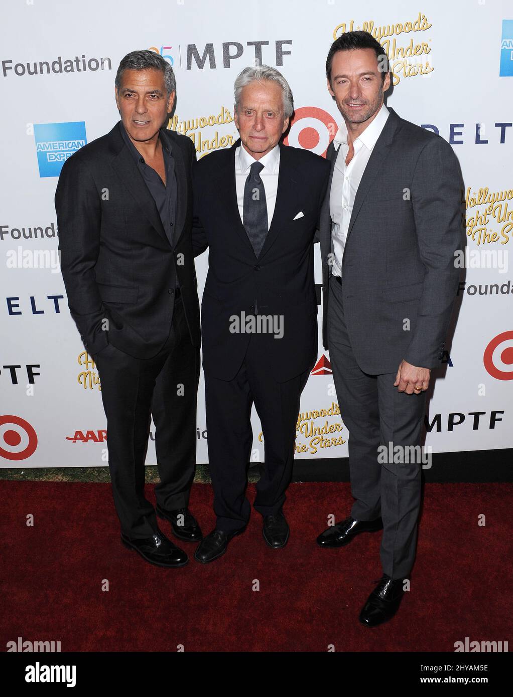 George Clooney, Michael Douglas, Hugh Jackman attending the 'Hollywood's Night Under The Stars' 95th Anniversary Celebration held at MPTF Wasserman Campus in Los Angeles, USA. Stock Photo